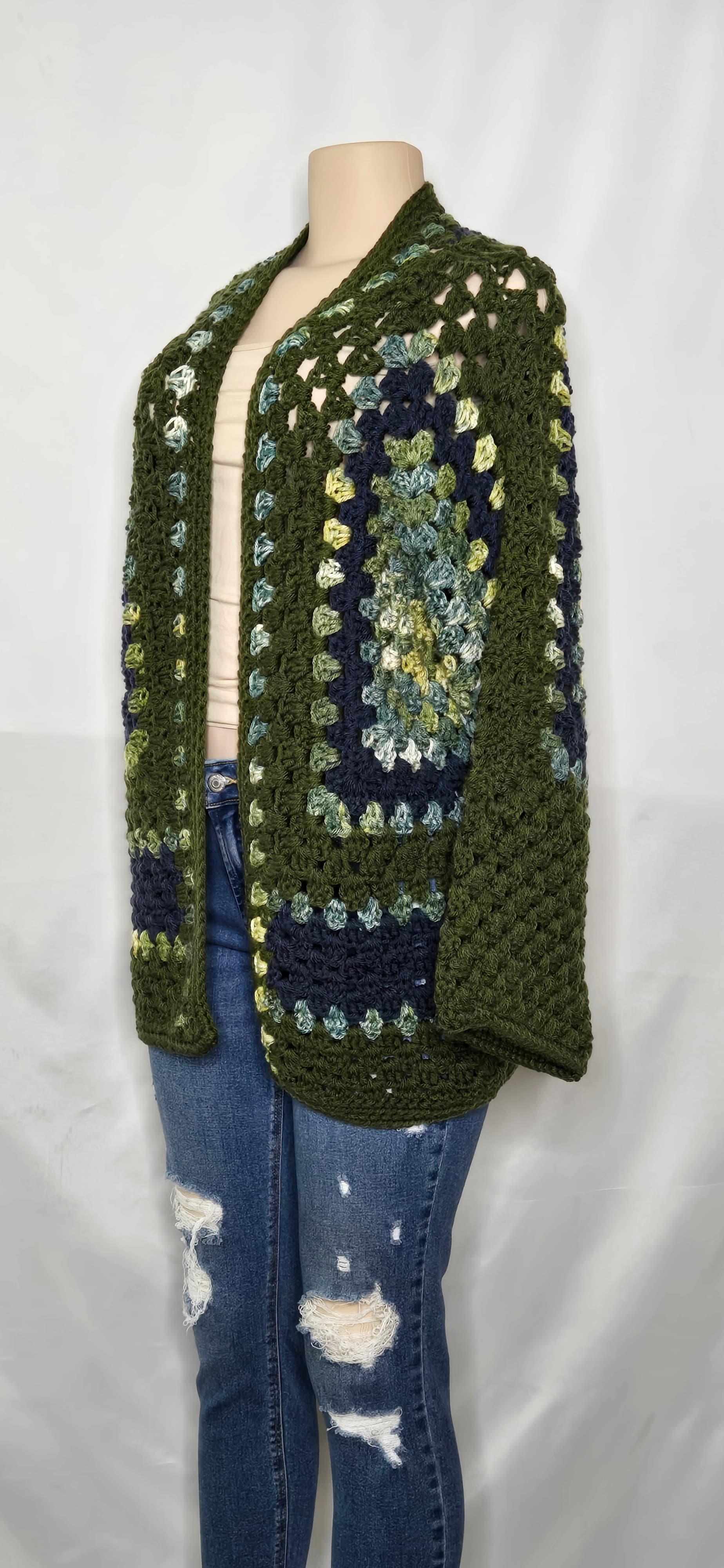 Green crocheted cardigan profile