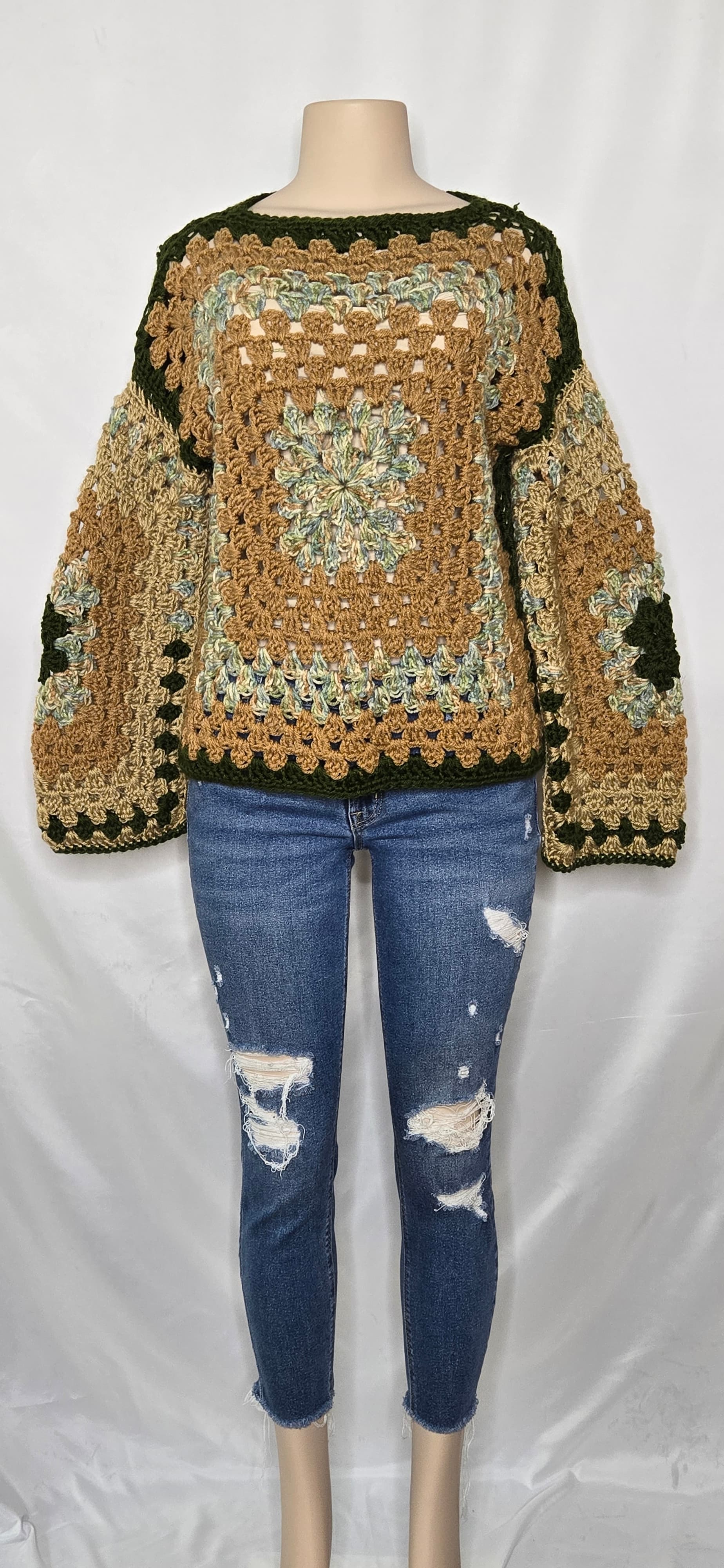 Tan and green crocheted sweater